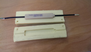 Apertura involucro resina